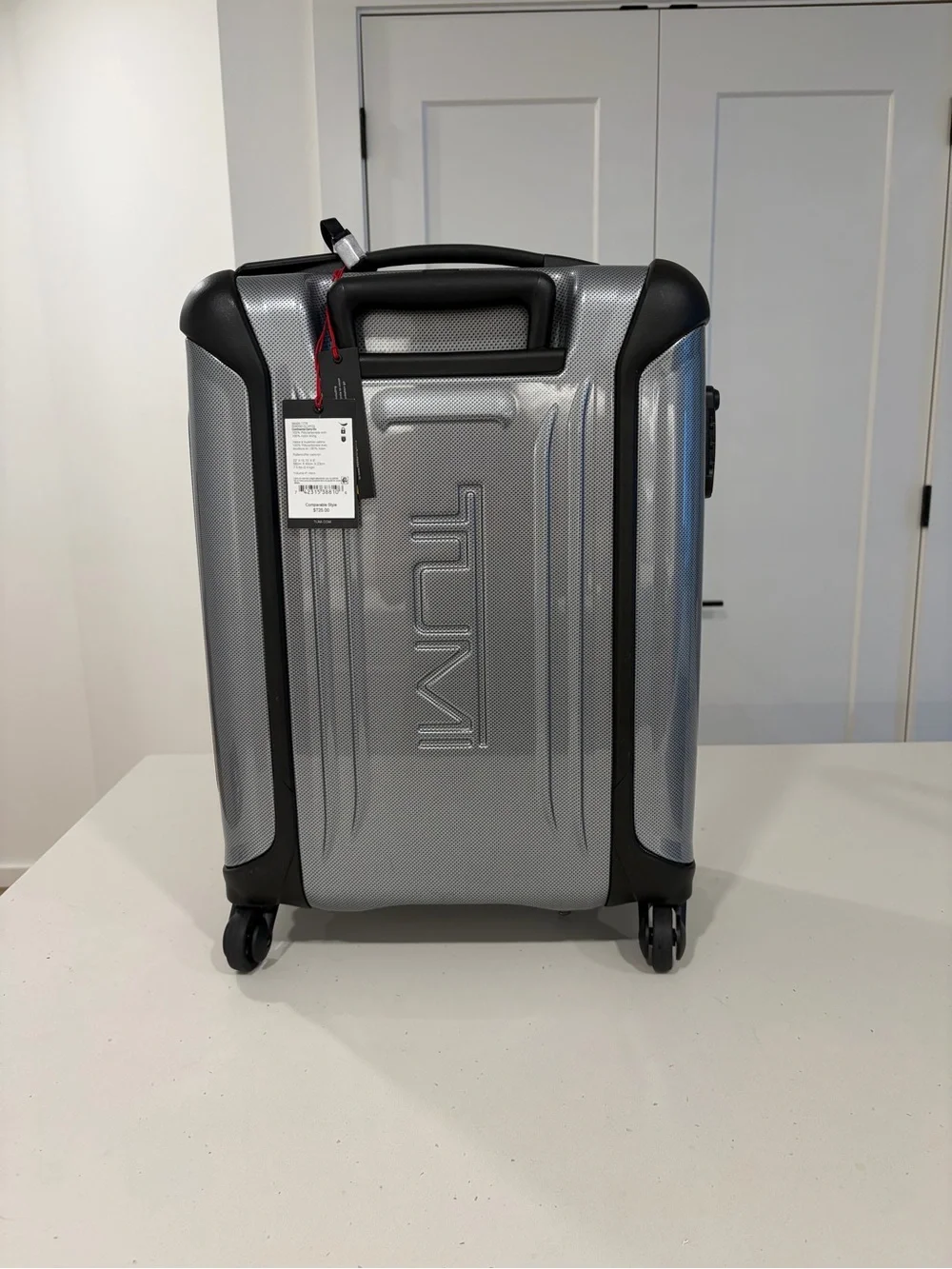 Tumi Hard Shell Spinner Luggage Set in Blue and Silver